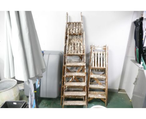 Three sets of vintage wooden step ladders