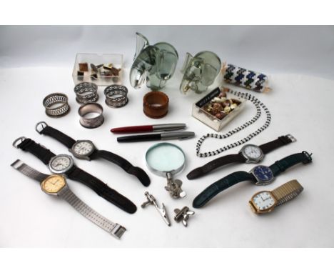 Gentleman's wrist watches including Timex expedition, beads, napkin rings, cuff links, glass elephant paper weights, Parker b