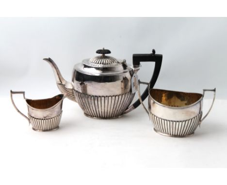 Three piece plated ware tea set, teapot, milk jug and sugar basin 