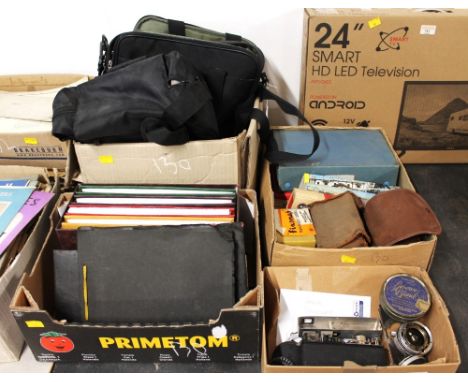 Four boxes of vintage camera bags, camera equipment, photo albums, books, projector slides etc