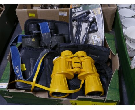 Tasco 7 x 50 model 222YRZ yellow binoculars and set of Swift Audubon 8.5 x 44 binoculars and Bushnell car window mount and tr