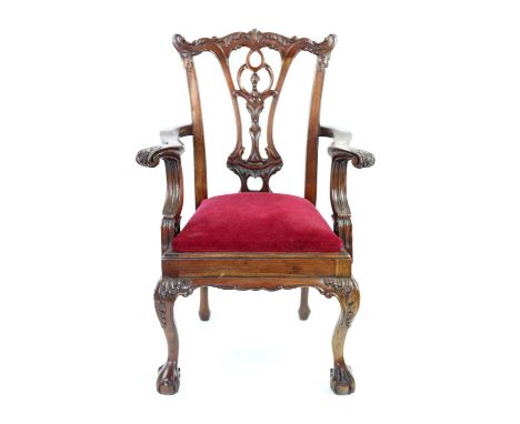 Early 20th century mahogany Chippendale style  miniature arm chair with pierced scrolling floral splat back on acanthus cabri