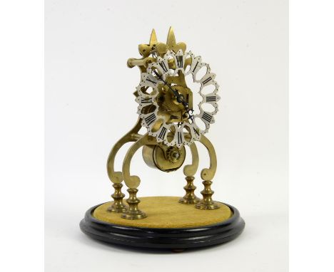 Late 19th century brass skeleton clock, with single fusee movement, silvered pierced dial with Roman numerals, on ebonised ci