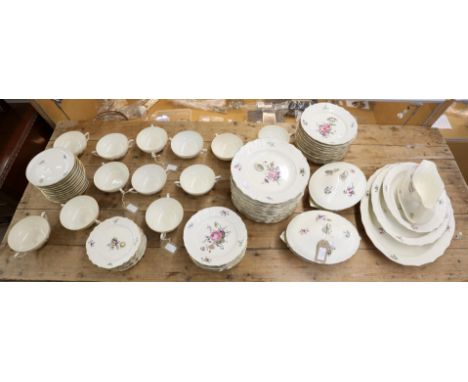 Extensive Royal Copenhagen dinner service with blind lattice border and floral decoration, comprising three graduated meat pl