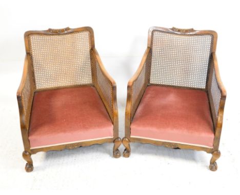 Early 20th century Bergere suite single cane back  and sides stuff over seats claw and ball feet comprising 2 seater sofa and