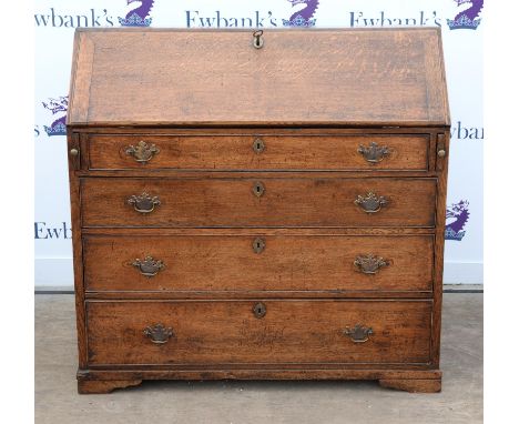 19th century oak bureau fall front enclosing fitted interior with drawers and pigeon holes above four graduated drawers to br