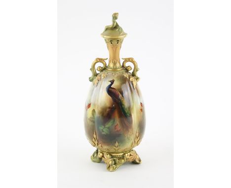 Henry Martin (1887-1917) for Royal Worcester a twin handled ovoid vase with hand painted decoration of a peacock, signed H W 