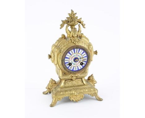 Early 20th century French brass mantle clock with enamel dial, the two train movement striking on a bell. The case stamped Br