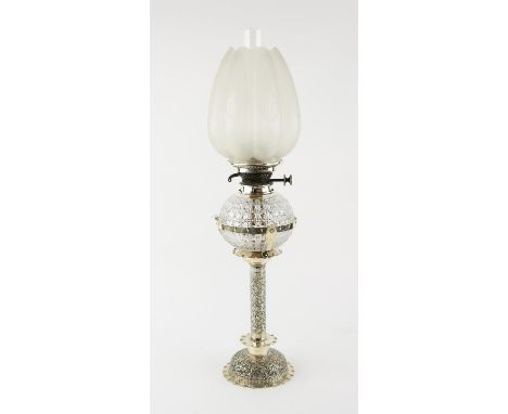 Silver plated oil lamp by Hukin & Heath with scrolling foliate decoration and cut glass reservoir, the tulip shaped frosted g