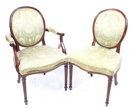 Set of eight early 20th century mahogany oval back dining chairs, with light green upholstery with vignettes of cherubs and d