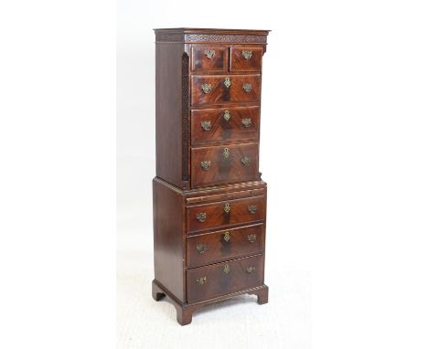 Georgian style mahogany Chest on Chest with moulded blind fret work frieze over two small drawers and three graduated long dr