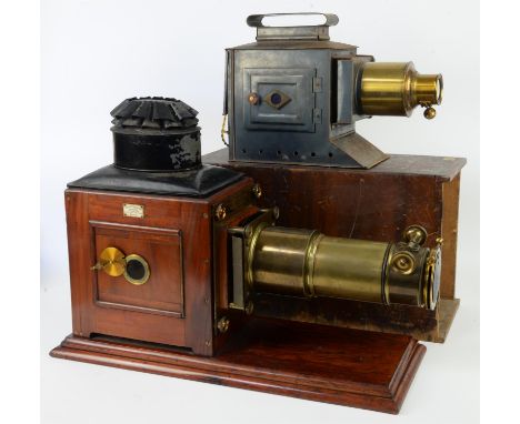 Early 20th century mahogany, brass and lacquered tin Magic Lantern by Newton & Co. Fleet Street, London, the lens cover marke