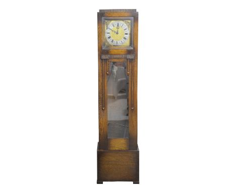 Art Deco oak longcase clock, three train movement chiming on eight rods, the square dial with Roman and Arabic chapter ring, 