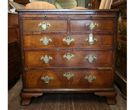 AMENDED DESCRIPTION 19th century bachelor's walnut chest, with brushing slide over two short and three long graduated drawers