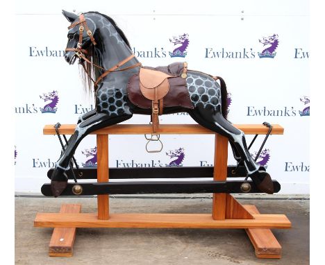Modern black painted and dappled rocking horse, 137cm high,Condition Report:  Minor wear to saddle with waterspots on light l