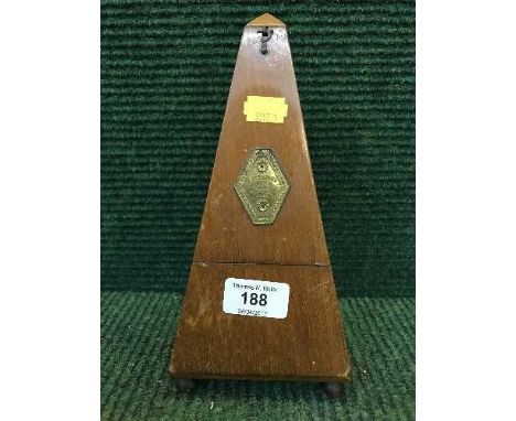 A mahogany cased French metronome 
