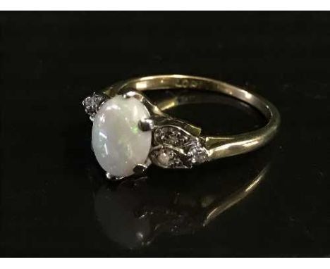 An 18ct gold opal and diamond set ring