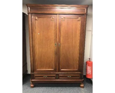 A late Victorian mahogany double door wardrobe
