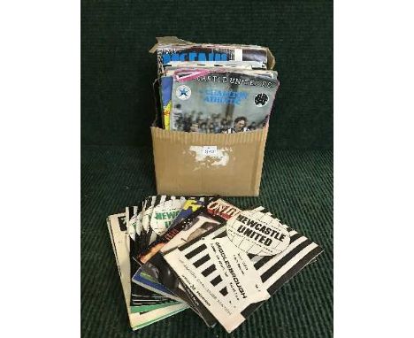 A box of a quantity of mid twentieth century and later Newcastle United programmes, 1969 v Sunderland programme, Two books NU