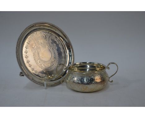 A Victorian Arts &amp; Crafts silver two-handled sugar basin in the form of a porringer with nail-engraved roundel design, Ed