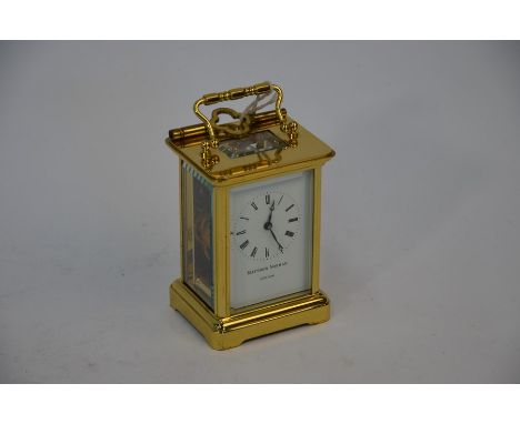 A good quality brass carriage clock by Matthew Norman of London, 11 cm high&nbsp;