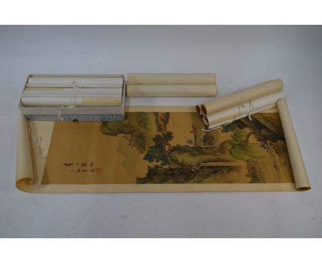 A set of four Chinese 20th century scroll paintings of extensive seasonal mountainous landscapes, with calligraphy inscriptio
