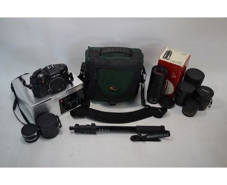 A Leitz Leica R9 camera, body no.2883389 c/w original box and instructions (little used) with an Ernst Leitz Wetzlar Vario-El