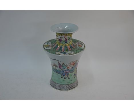 A 20th century Chinese famille rose vase painted with polychrome enamels the short flared neck and flattened shoulder decorat