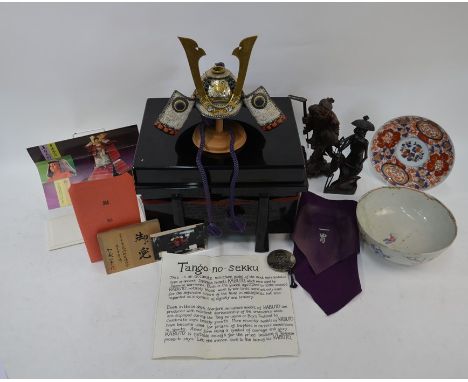 A mixed lot of Asian collectables and ceramics including a Japanese miniature Kabuto displayed in Japan during the 'Boys Fest