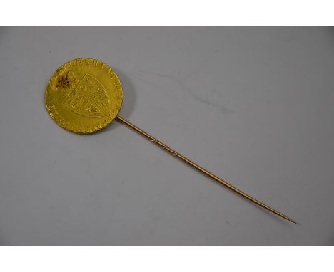 A 1788 guinea mounted as a stick pin, 9.4g