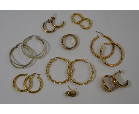 Eight various pairs of 9ct yellow gold earrings for pierced ears including twisted hoop, half hoop, knotted studs etc to/w th