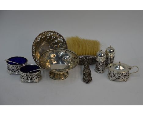 A late Victorian table-brush with ornate silver handle, Birmingham 1900 to/w a pair of pierced sweetmeat bowls on stemmed bas