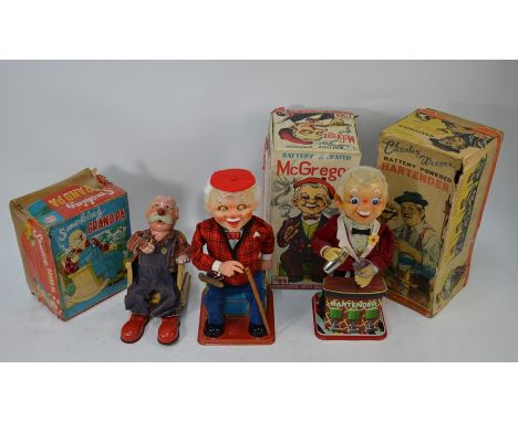 Four 1960s Japanese tinplate automaton figures with battery operation - 'McGregor', 'Bartender' and 'Smoking Grand Pa' - all 