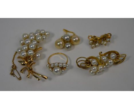 Mikimoto - A cultured pearl cluster ring, yellow metal set stamped K14 and M, size Q; a Mikimoto cultured pearl spray brooch,