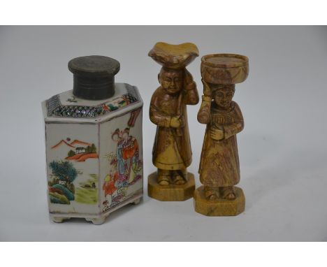 A 19th century Chinese famille rose caddy of hexagonal form with cylindrical neck and pewter cover standing on six bracket fe