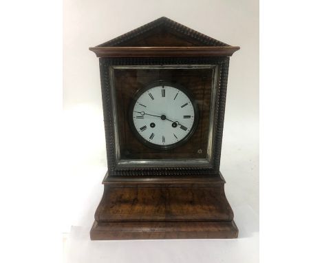 A 19th century eight-day mahogany cased two train mantel clock with white enamelled dial, 42 cm high