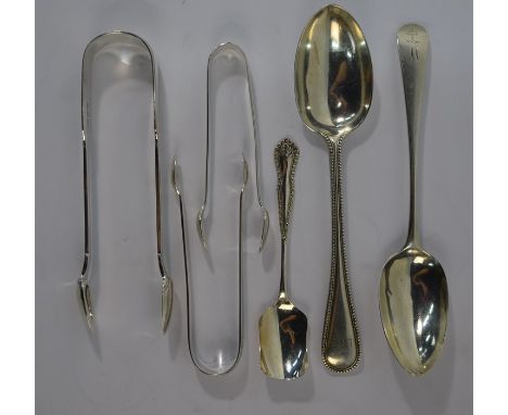 A pair of early Victorian silver fiddle &amp; thread sugar tongs, John Stone, Exeter 1837 to/w an OEP dessert spoon, Peter &a