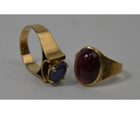 Two contemporary rings - one set oval cabochon garnet, size N, the other with high set opal doublet, size N (2)