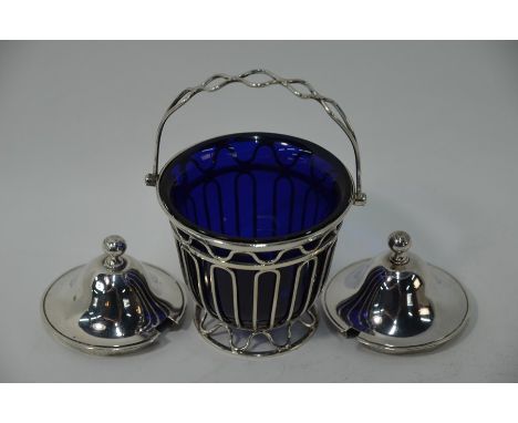 A late Victorian silver wire sugar basket with swing handle and blue glass liner, Haseler Brothers, London 1899 to/w a pair o