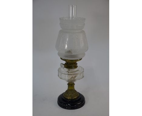 An Edwardian oil lamp with frosted glass shade, cut glass font and brass stem&nbsp;very good overall, on inspection there app