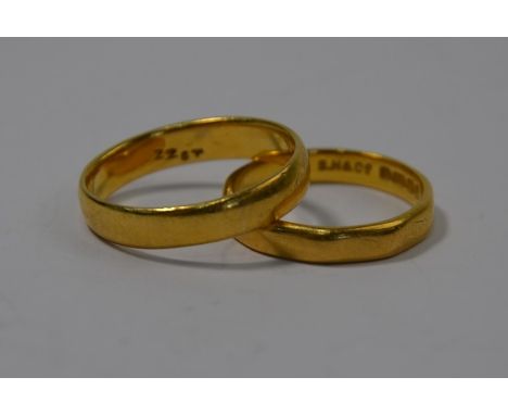 Two 22ct yellow gold wedding bands, size O and R, approx 9.9g (both distorted) (2)