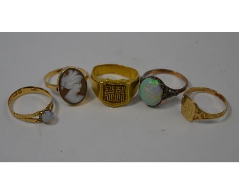 Five various rings - oval opal; round opal set 18ct yellow gold; oval cameo ring set 14ct; and two foreign yellow metal signe