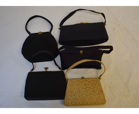 A collection of five 1940s corded black handbags, two petite-point evening bags with classical/floral design with chains (one