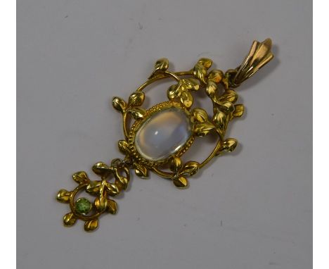 A late 19th century yellow gold pendant, the central oval cabochon moonstone surrounded by an open frame of leaves and tendri