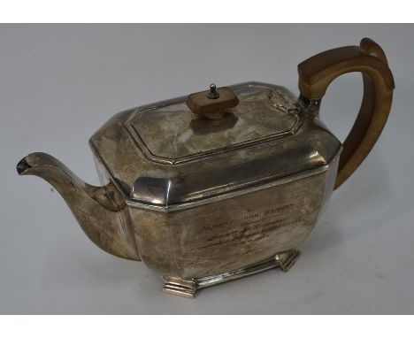A heavy quality Scottish silver teapot with composite handle and finial, Hamilton &amp; Inches, Edinburgh 1936, 20oz grossPre