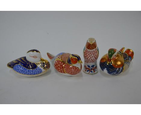 Four Royal Crown Derby Imari decorated paperweights - Two ducks, one gold stopper and one silver stopper, a pheasant and wood