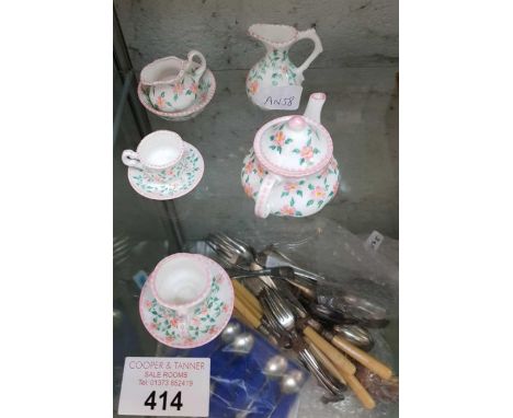 Miniature ceramic tea service hand painted by 'Agneta Hickley' of Rimpton in Somerset