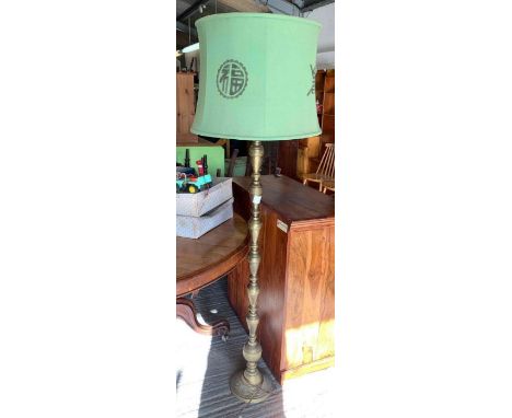 Oriental style brass standard lamp with shade