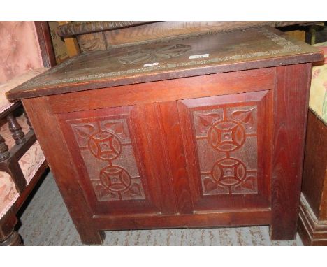 Decorative carved oak trunk/blanket box