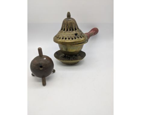 A late 19th/early 20th century Indian cast brass oil lamp with oil container,Kerala,South India,  H.14cm